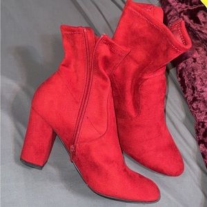 Red heel boots. Never worn. Too small for me